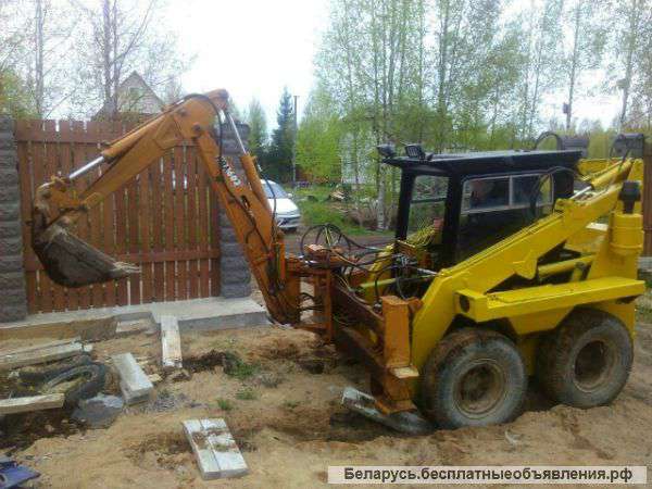 Мини экскаватор в Ратомке. Планировка участка, копка ям, траншей