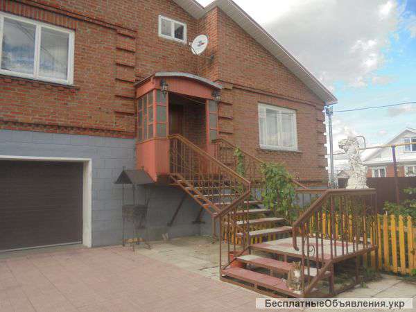 Кирпичный коттедж в 3-х уровнях