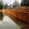 Берегоукрепление бревнами лиственницы, укрепление берегов