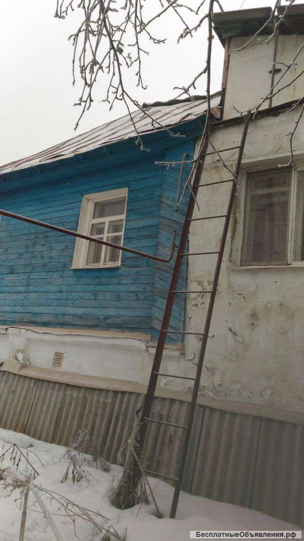 Половину деревянного дома на ул.Донская