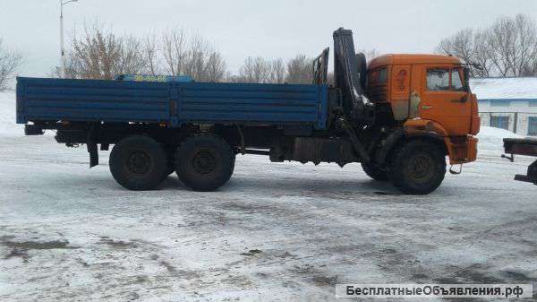 Перевозка бревен манипулятором