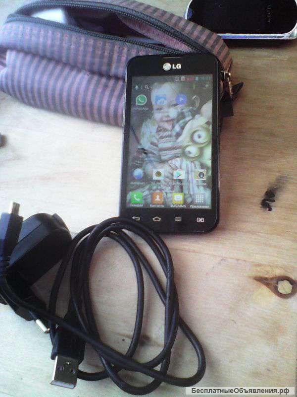 Телефон LG E450