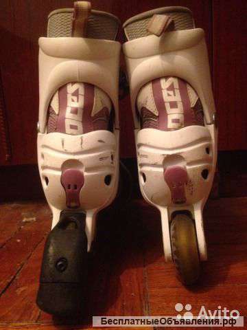 Роликовые коньки