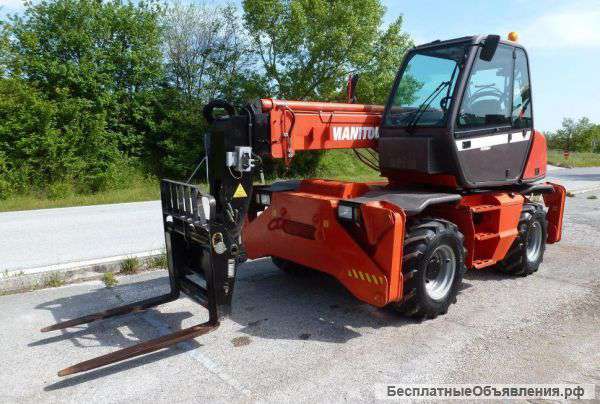 Manitou MRT 1432  -телескопический погрузчик