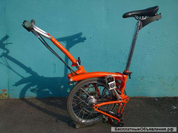 Велосипед brompton M6L оранжевого цвета