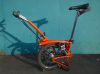 Велосипед brompton M6L оранжевого цвета