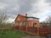 1/2 изолированную часть коттеджа с участком