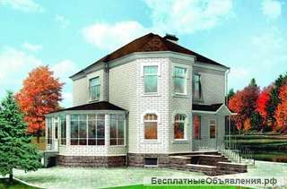 Двухэтажный дом-замок из кирпича 9Х11 м с разноуровневой крышей