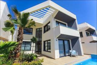 Недвижимость в Испании, Новые виллы рядом с пляжем от застройщика в Торревьеха, Коста Бланка