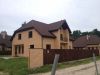 Хозаен продает два новых дома в Риге