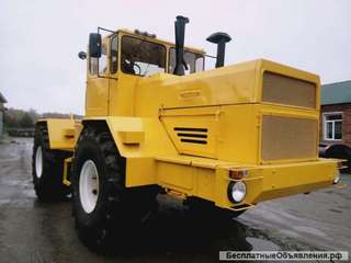 Трактор Кировец К701 со снегоуборочным отвалом