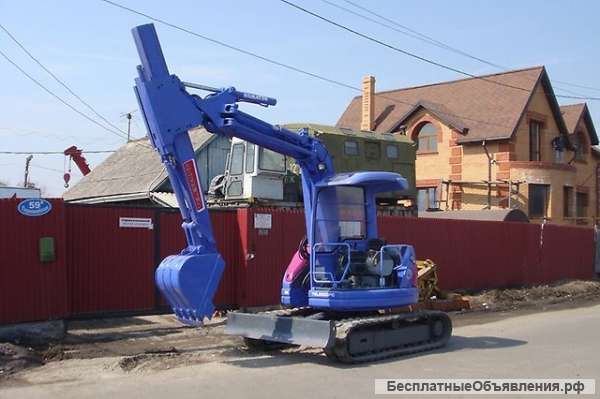 Японский экскаватор с телескопической стрелой Komatsu PC50UU-2