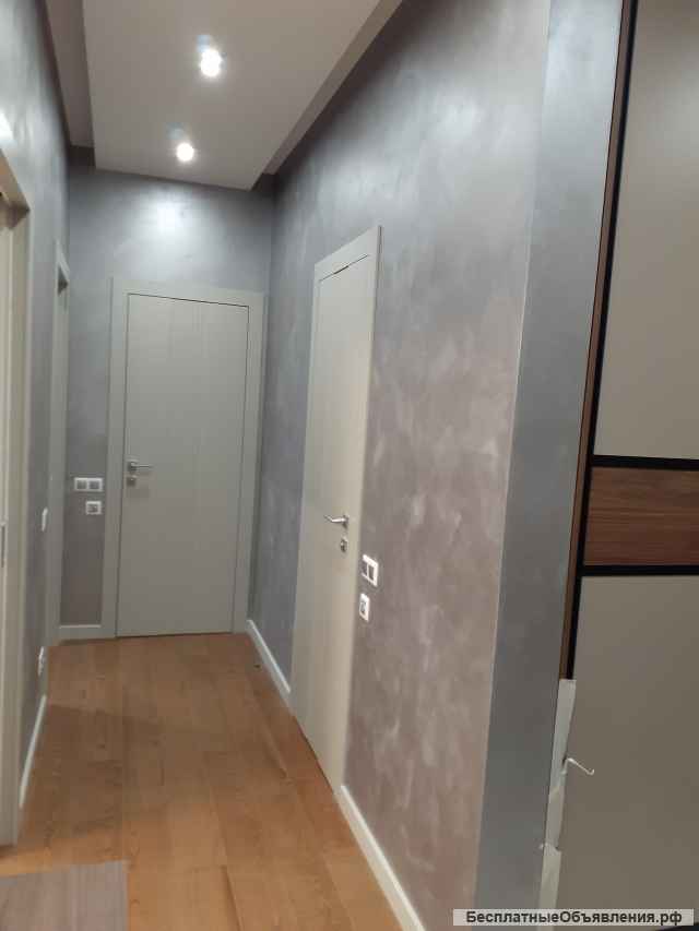 Нанесение декоративной штукатурки. Отделка