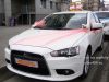 Белый Mitsubishi Lancer X для свадеб