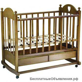 Детскую кроватку "Марьяна-2"(орех) колесо-качалка.ящ.