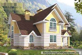 Дом из пенобетона с мансардой и фигурной крышей