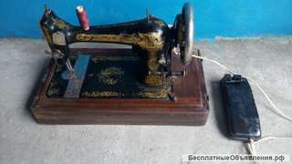 Швейная машинка Singer Е 662721 с электроприводом