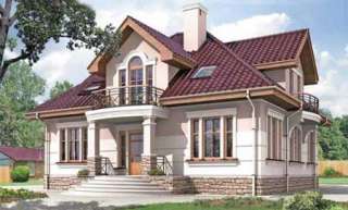 Двухэтажный дом из газобетона 12х12 м с фигурной крышей