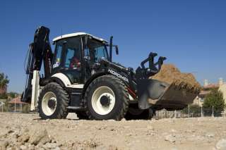 Услуги экскаватора-погрузчика