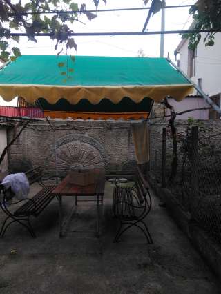 Дом с земельным участком общей площадью в 6,12 соток