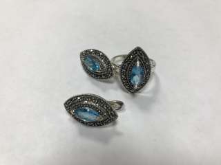 Серебряные серьги и кольцо с голубым топазом