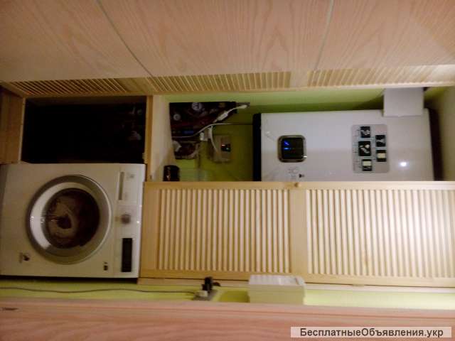 Шкаф из жалюзийных дверей для закрытия бойлера и стиральной машины