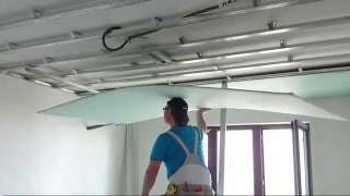 Гипсокартонщики с оборудованием