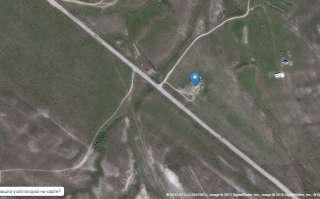 Земельный участок с коневодческой фермой