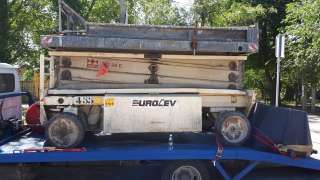 Ножничный подъемник Хolland lift X-105EL16