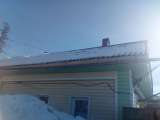 Чистка снега с крыш домов и близлежащей территории