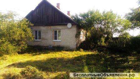 Дом с земельным участком