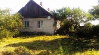 Дом с земельным участком