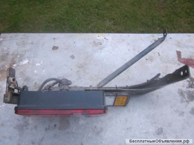 Фонарь задний левый, б/у, в сборе с кронштейном для грузовых автомобилей Mercedes Atego