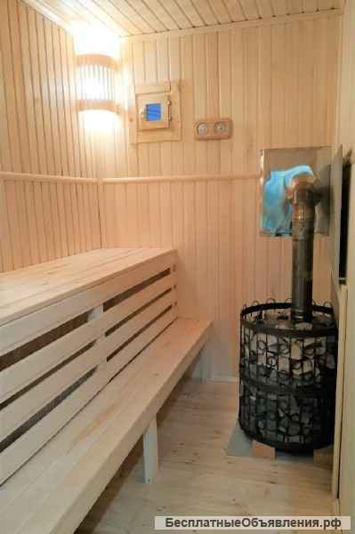 Двухэтажный коттедж с камином и баней