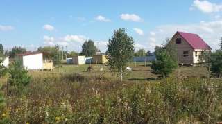 Участок под строительство дома в застроенном поселке Янтарный в 50 км от МКАД по Новорязанке