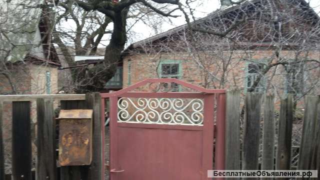 Дом с земельным участком