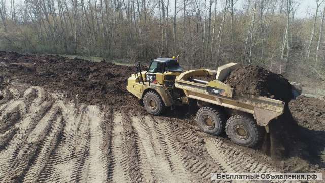 Водитель сочлененного самосвала