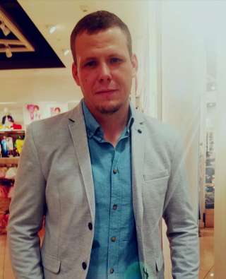 Носитель английского языка Американец