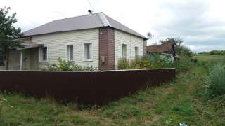 Дом с участком земли