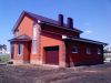 В Таврово 3 новый двухэтажный кирпичный дом с гаражом под финишную отделку