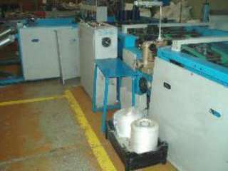 Автомат для резки и сшивки дна мешка