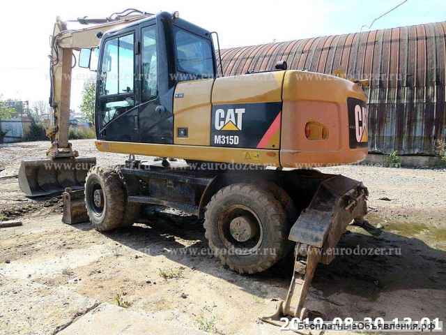 Колесный экскаватор CAT 315, 2013 г, 2 ковша