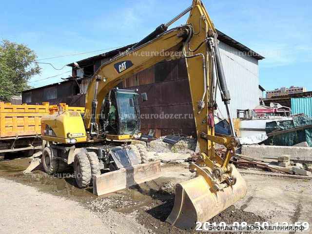 Колесный экскаватор CAT 315, 2013 г, 2 ковша