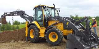 Аренда Экскаватора погрузчика Volvo