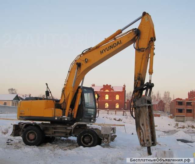 Экскаватор-полноповоротный колёсный с гидромолотом