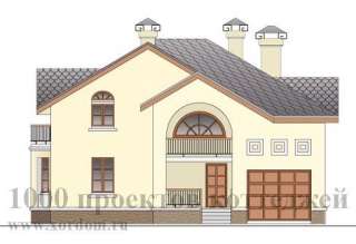 Двухэтажный кирпичный дом с арочными окнами и эркерами