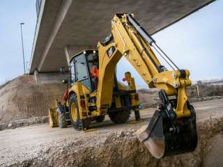 CAT 428F б/у экскаватор-погрузчик 2014 года