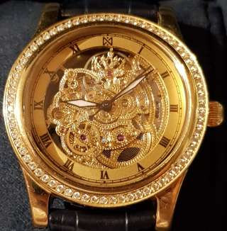 Золотые эксклюзивные часы 750 пробы