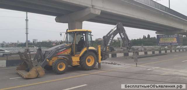 Услуги экскаватора-погрузчика