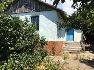 Домовладение в с. Казанки Бахчисарайского района общей площадью дома-35 м2.